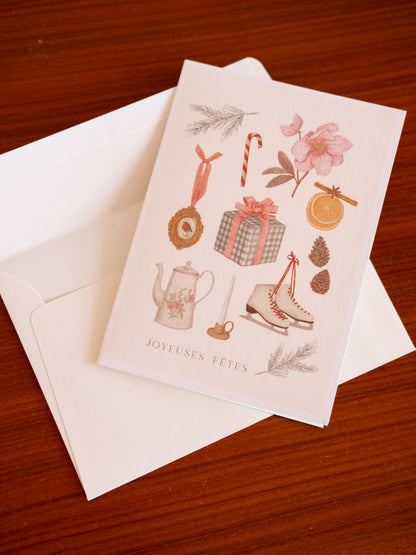 Carte de Noël Joyeuses Fêtes avec enveloppe – packshot fond bois | Pablo est une fille