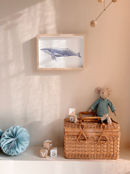 Affiche douce d'une baleine dans une chambre d'enfant
